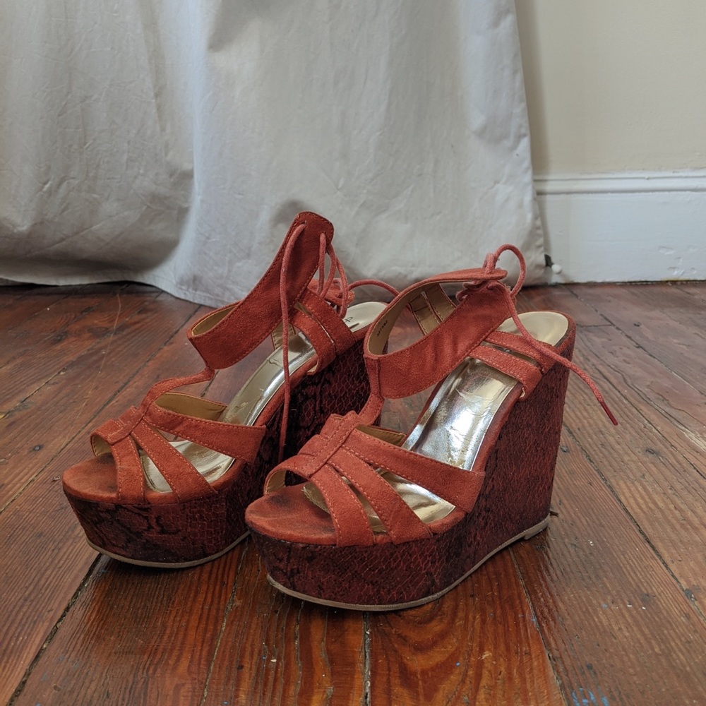 Orange snakeskin wedges
